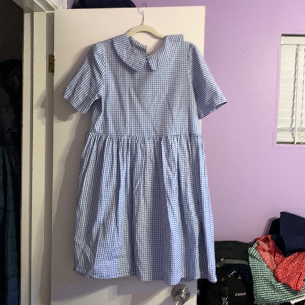 Olive Clothing ‘Nancy Check Dress’ in blue.